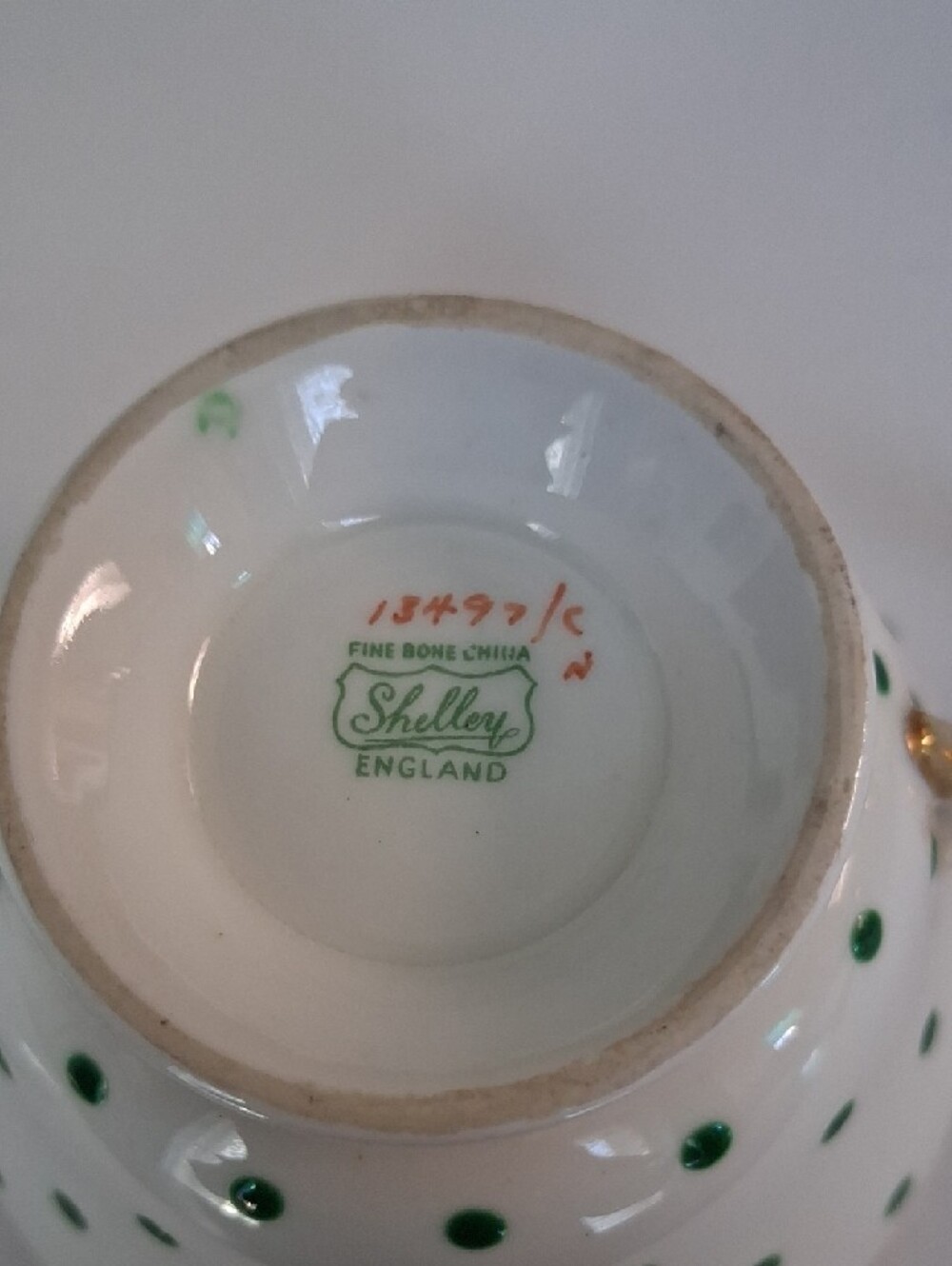 White Teacup and Saucer with Green Polka Dots and Gold Trim - Picture 4 of 4